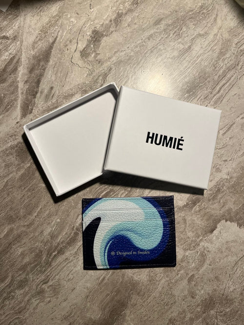 Humié korthållare
